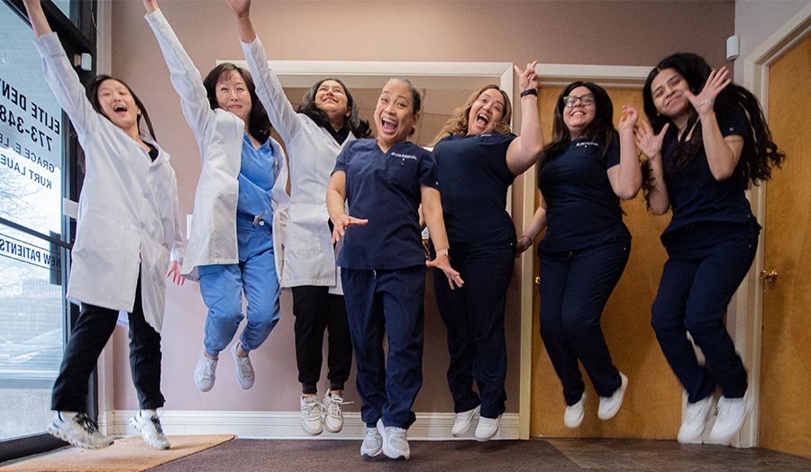The staff at Elite Dental in Chicago, IL taking a fun picture